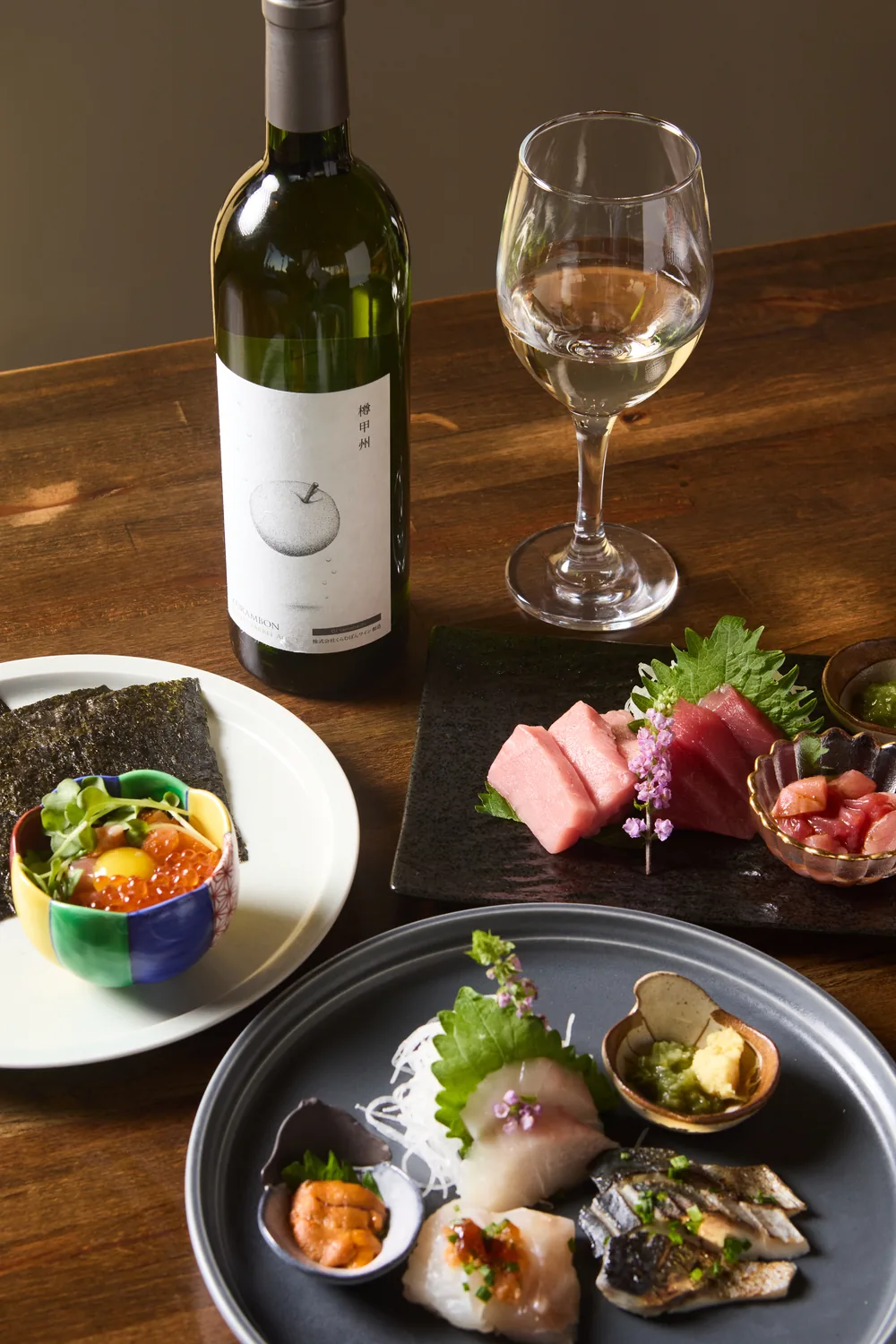 Sashimi and Japanese wine set on the table