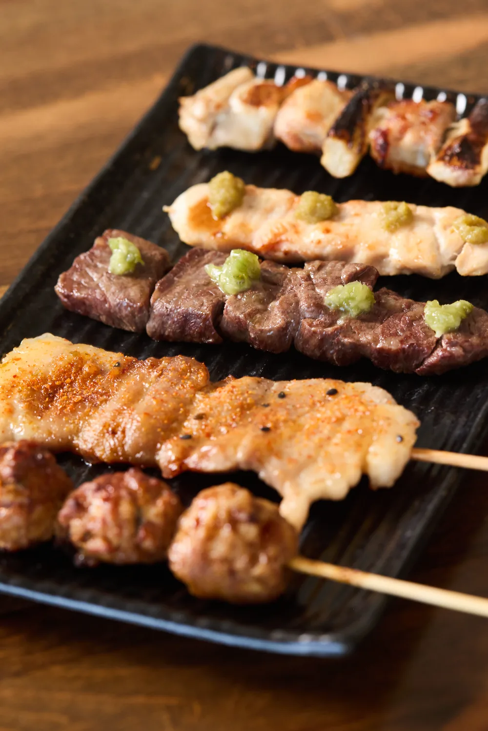 Yakitori platter, close-up on the grilled skewers
