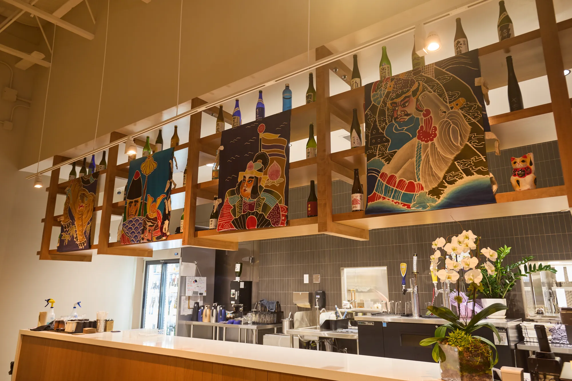 Sake shelf with painted folk-art banners